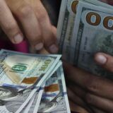 Dólar cai quase 1%, e Ibovespa recua após tombo eleitoral